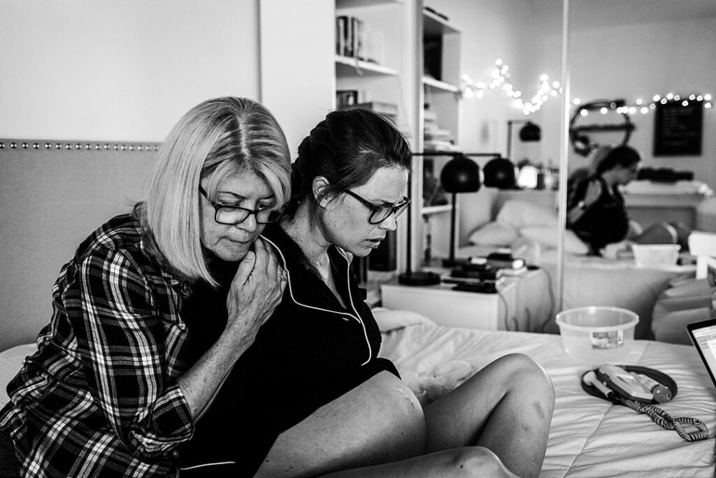 Mother Hugging her daughter who is in labor