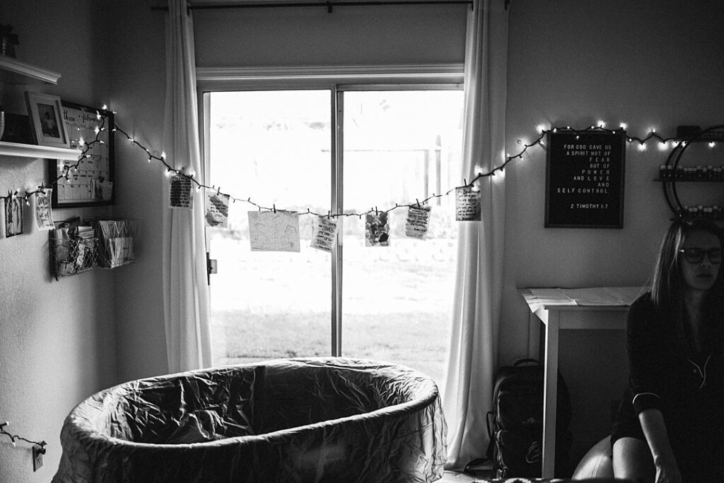 Birth Affirmations set up behind birth tub at home birth